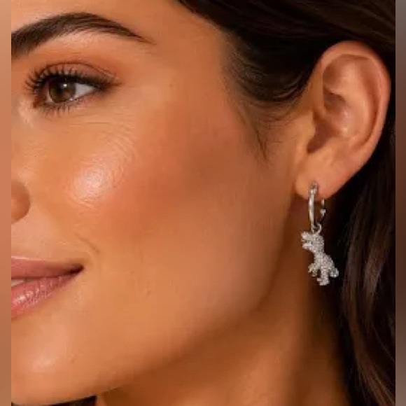 Coach Jewelry - Authentic new Coach Silver Crystal Dinosaur Drop Earrings
